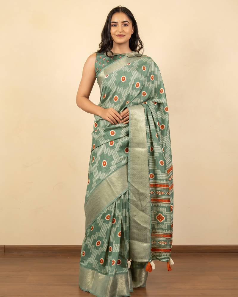 green geometric print cotton silk saree with blouse piece