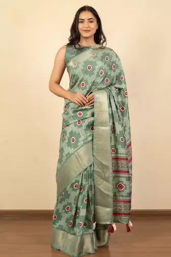 green geometric print cotton silk saree with blouse piece