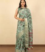 green geometric print cotton silk saree with blouse piece