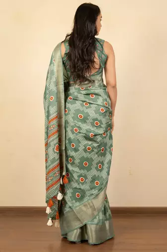 green geometric print cotton silk saree with blouse piece