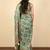 green geometric print cotton silk saree with blouse piece