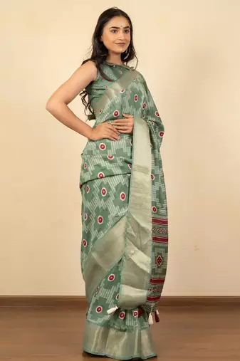 green geometric print cotton silk saree with blouse piece