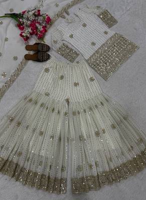 Premium white designer sharara set with heavy golden work 2