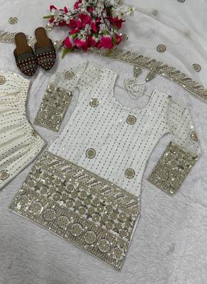 Premium white designer sharara set with heavy golden work 3