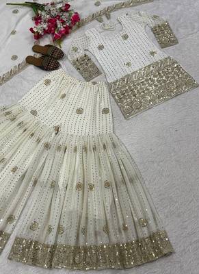 Premium white designer sharara set with heavy golden work 4