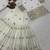 Premium white designer sharara set with heavy golden work