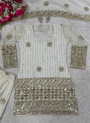 Premium white designer sharara set with heavy golden work 5