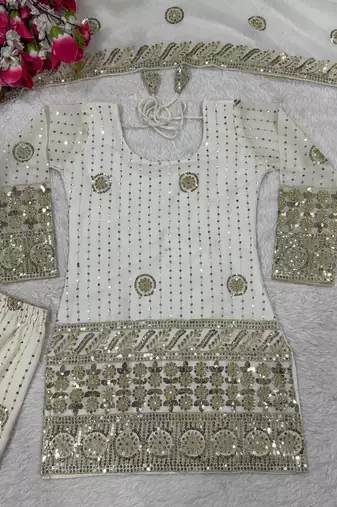 Premium white designer sharara set with heavy golden work
