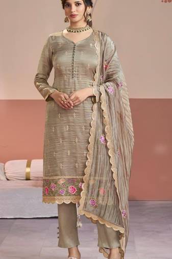 Chiku gold silk semi stitched suit with embroidery & zari work