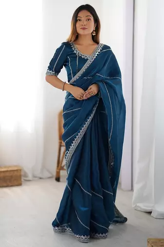 teal blue color art silk blend thread sequince embroidered work saree with blouse