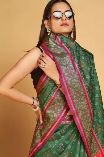 green silk blend printed saree with blouse