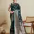 green satin printed saree with blouse