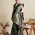 green satin printed saree with blouse