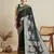 green satin printed saree with blouse