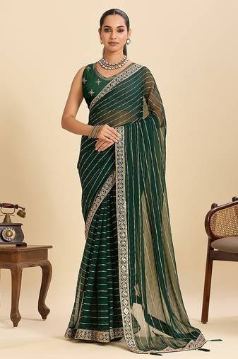 green georgette printed saree with blouse