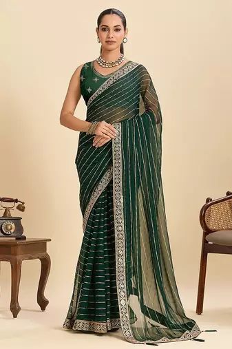 green georgette printed saree with blouse