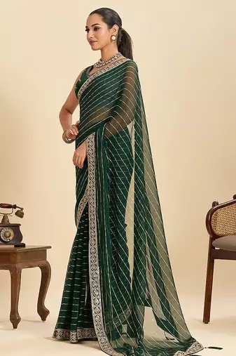 green georgette printed saree with blouse