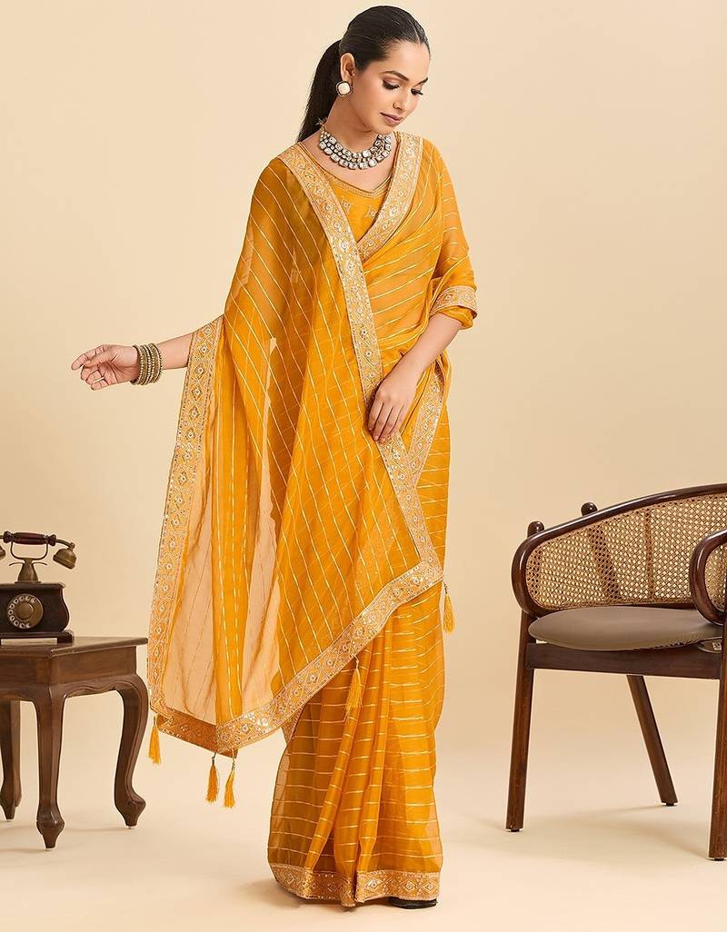 yellow georgette printed saree with blouse