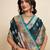 green satin printed saree with blouse