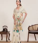 cream linen printed saree with blouse