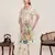 cream linen printed saree with blouse