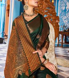 green silk blend banarasi saree with blouse 