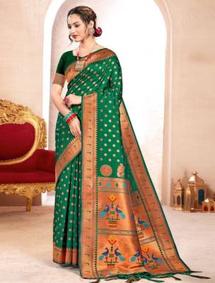 Emerald green silk blend saree with peacock motifs 1