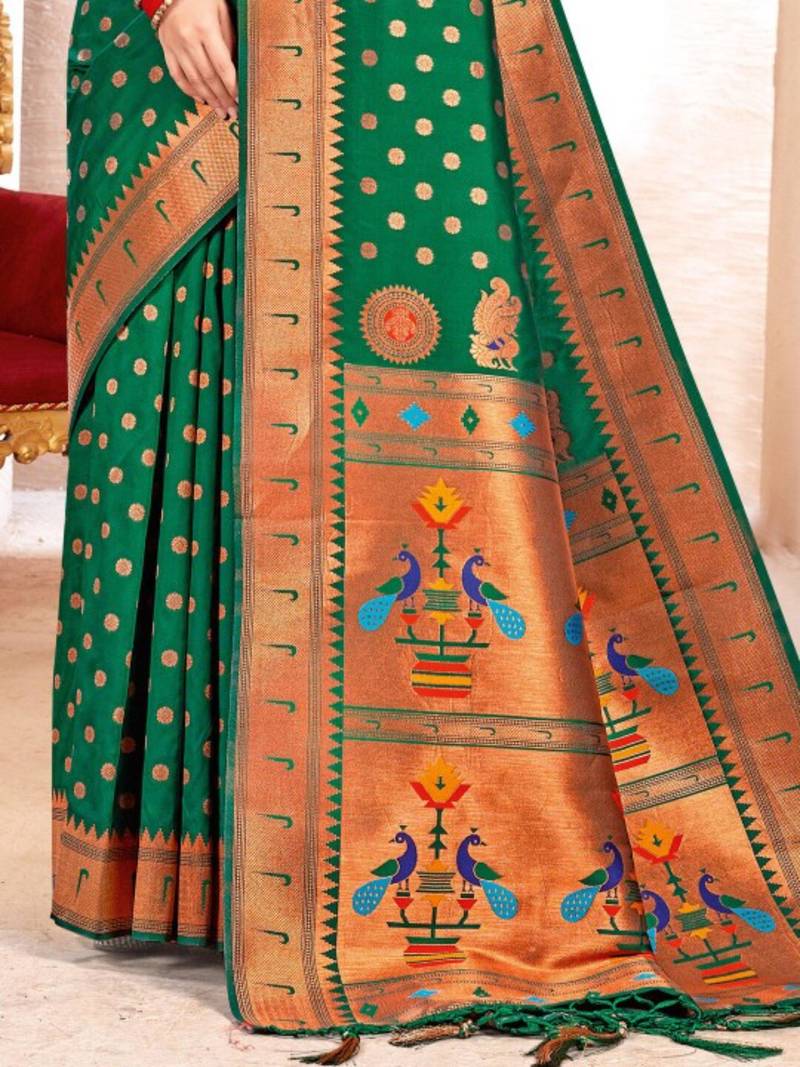 Emerald green silk blend saree with peacock motifs