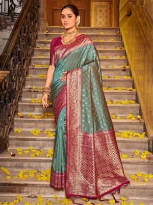 Teal green silk blend saree with magenta brocade 1