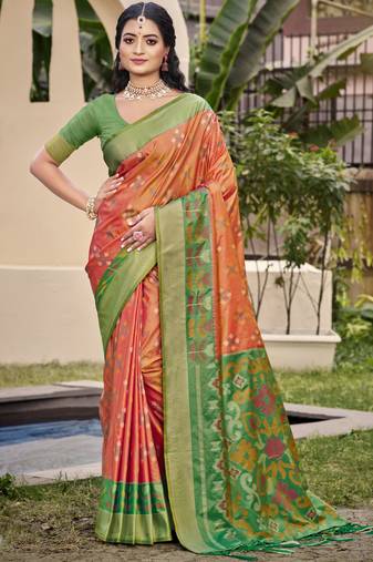 Vibrant orange and green patola-inspired silk blend saree