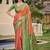 Vibrant orange and green patola-inspired silk blend saree