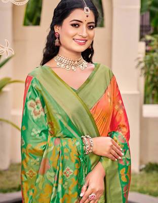 Vibrant orange and green patola-inspired silk blend saree 2