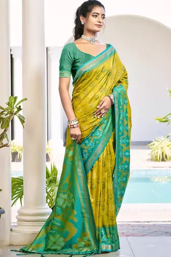 Mustard silk blend saree with teal ikat border