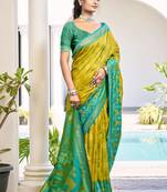Mustard silk blend saree with teal ikat border
