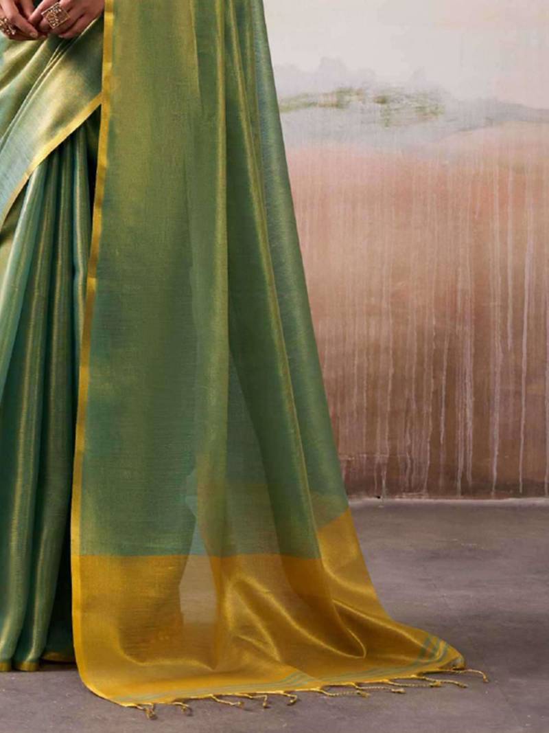 Green silk blend saree with golden border