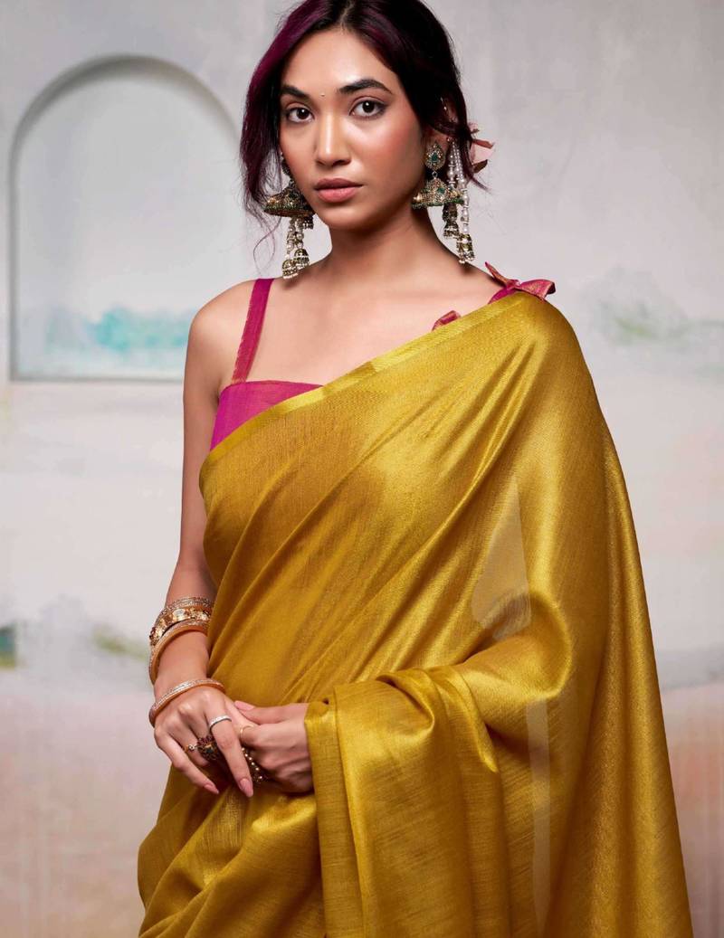 Mustard yellow silk blend saree with pink border