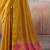 Mustard yellow silk blend saree with pink border