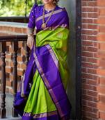 Vibrant green and deep purple silk blend saree with gold accents
