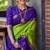 Vibrant green and deep purple silk blend saree with gold accents