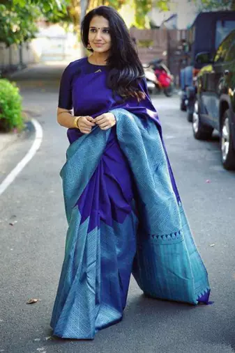 Royal blue silk blend saree with light blue geometric border patterns