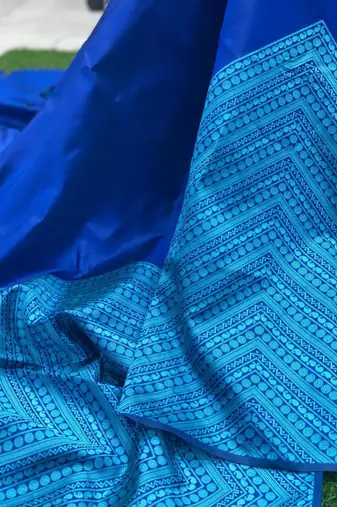 Royal blue silk blend saree with light blue geometric border patterns