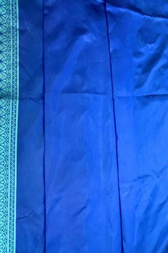 Royal blue silk blend saree with light blue geometric border patterns