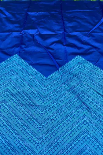 Royal blue silk blend saree with light blue geometric border patterns