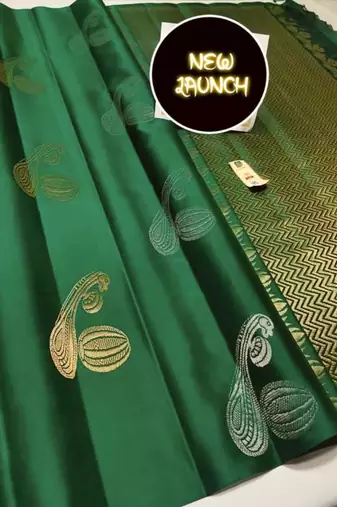 Deep forest green silk blend saree with gold zari paisley motifs