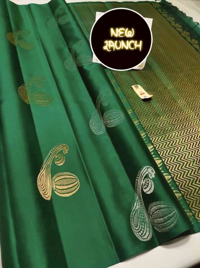 Deep forest green silk blend saree with gold zari paisley motifs