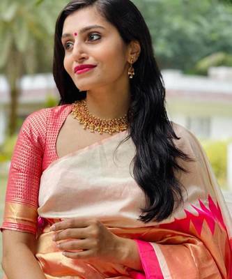 Cream off-white silk blend saree with striking pink and orange border 3