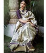 Luxurious silver cream silk blend saree with dark purple woven border