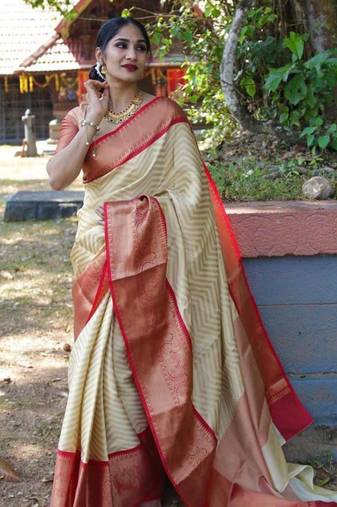 Elegant cream chevron silk blend saree with red border