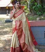 Elegant cream chevron silk blend saree with red border