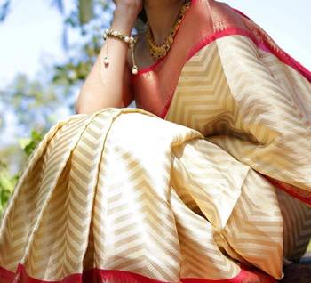 Elegant cream chevron silk blend saree with red border 3